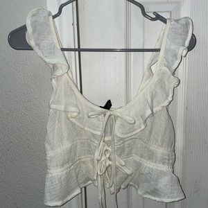 Tie-front tank top with flutter sleeves